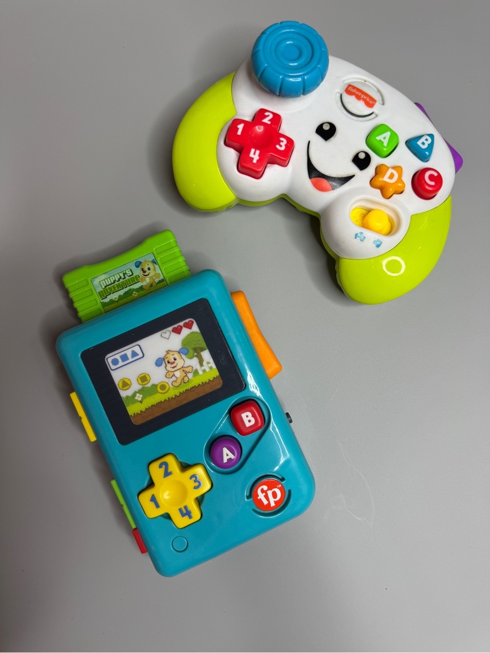 Fisher-Price Teal Handheld Learning Game & White Lime Controller